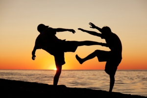 Fight on Beach at Sunset